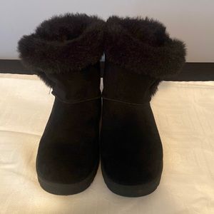 Barely worn, black warm boots,  I bought a size too small.